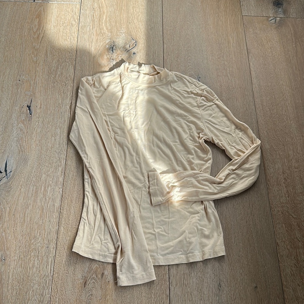 Cream colored American apparel thin turtle neck